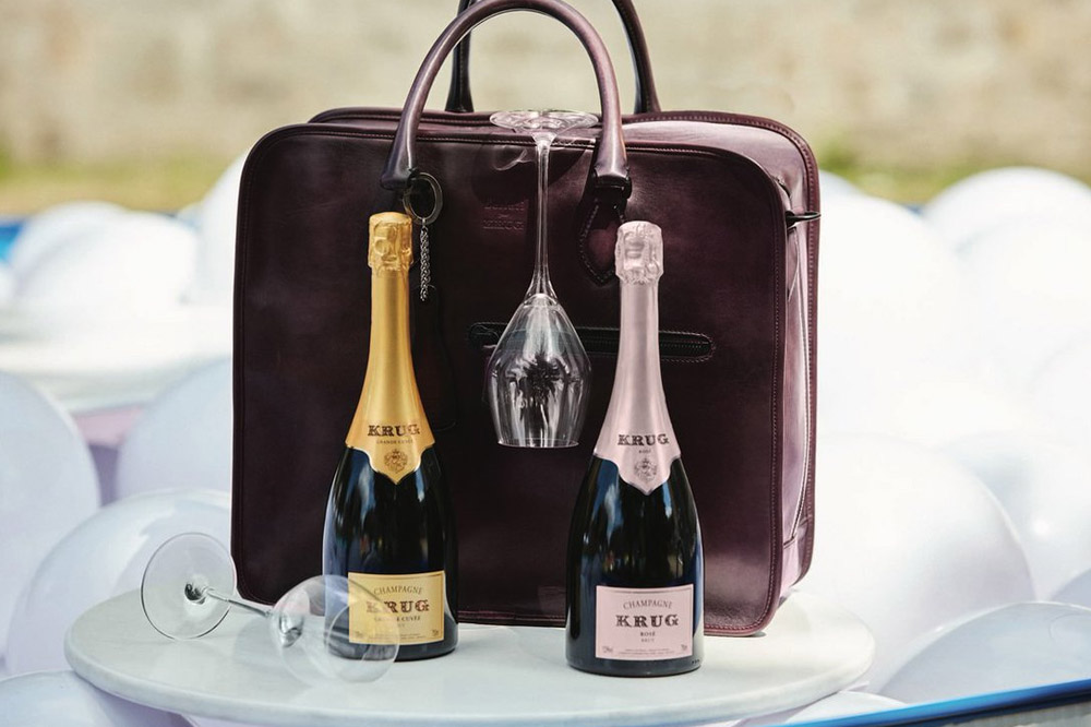 Krug by Berluti bags, the perfect carrier for both champagne and