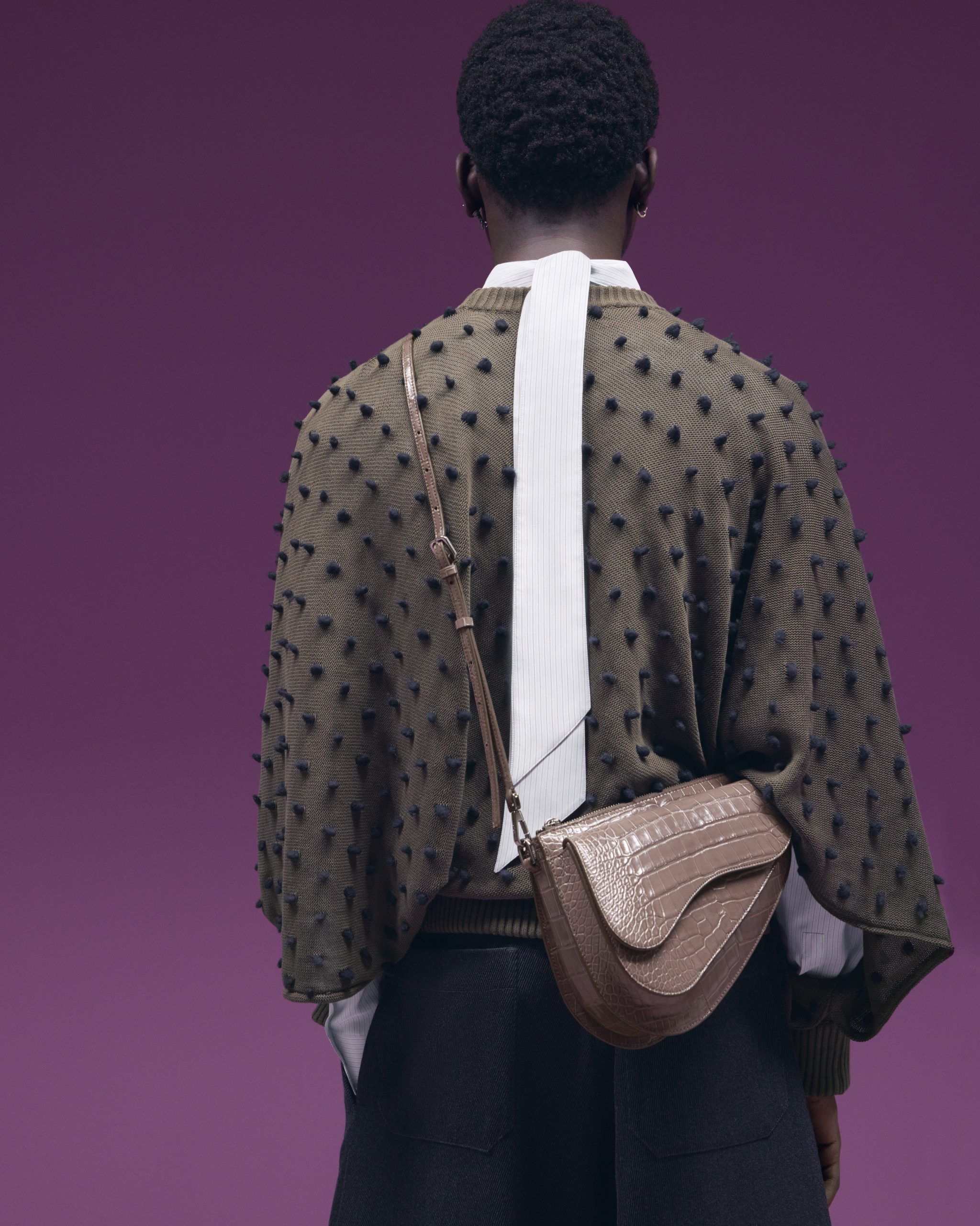 The Dior Saddle bag gets a new update in Oblique Gravity leather Men s Folio Malaysia